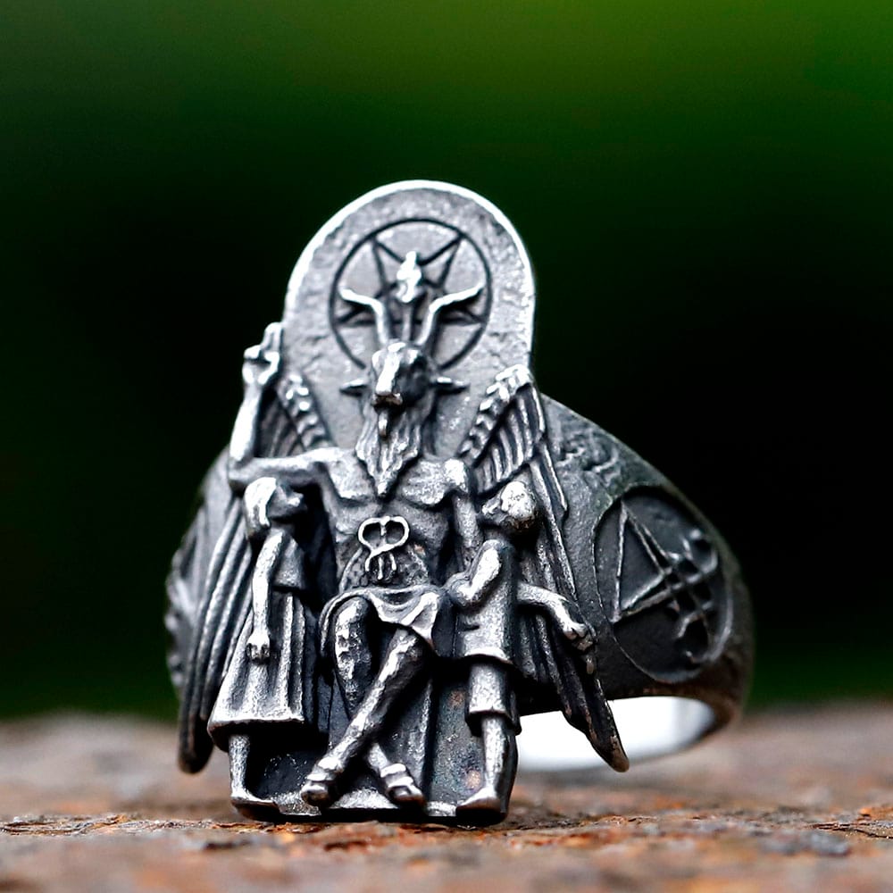 Baphomet signet ring for men in stainless steel, full view on dark background.