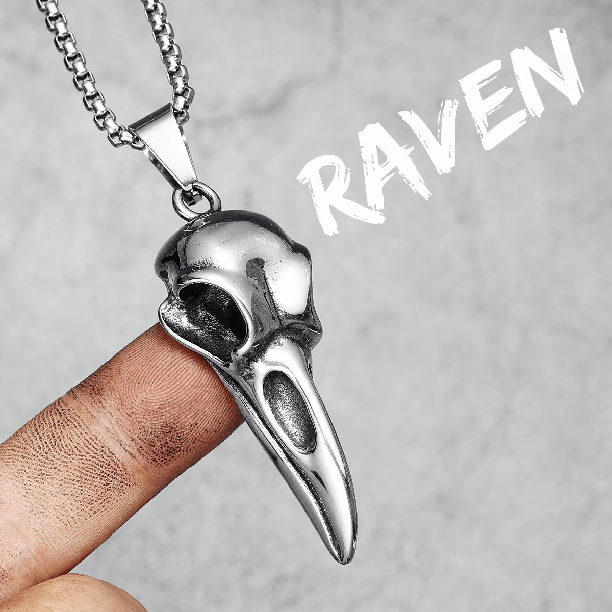 Back view of the 316L stainless steel raven skull pendant, showing its solid construction.