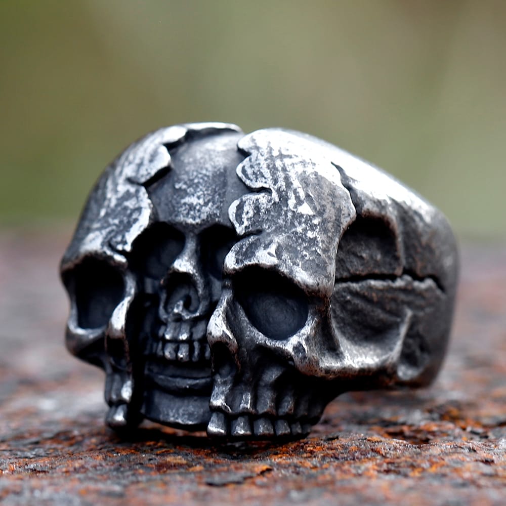 Side profile showing cracked textured skull design on heavy steel band