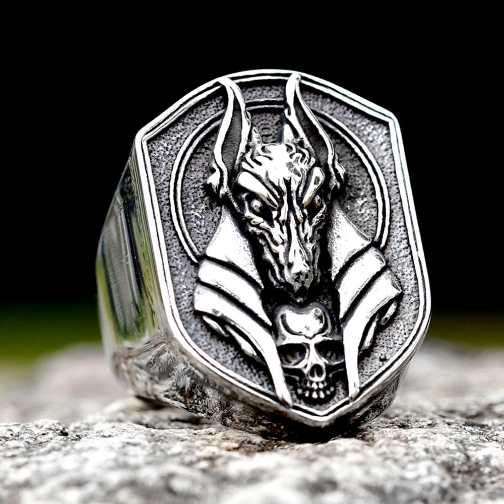 Close-up front view of the stainless steel Egyptian Anubis signet ring with skull accent