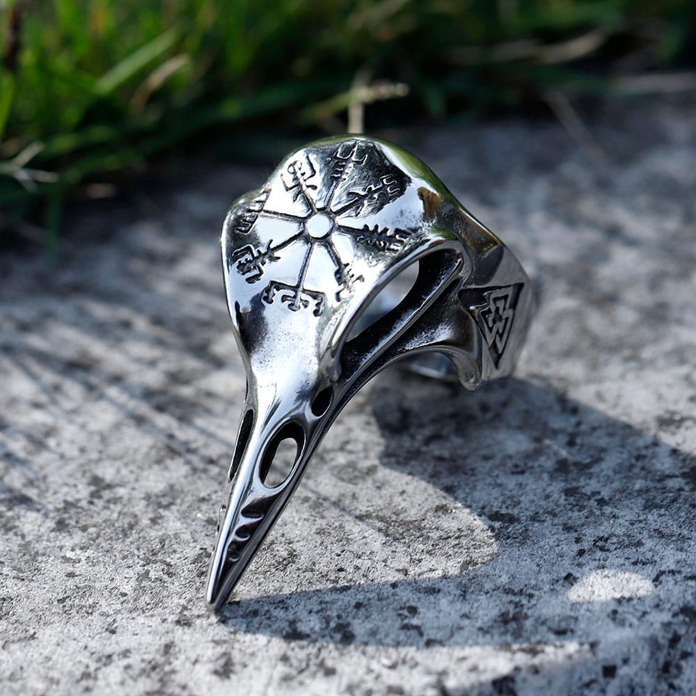 Close-up of the Vegvisir symbol engraved on the top of the stainless steel raven head ring.