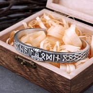 Side profile showcasing the detailed Celtic knotwork on the stainless steel wristband
