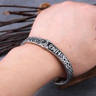 Viking rune and Thor's hammer cuff bracelet worn on the wrist for styling scale