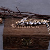 Close-up of the sculpted dragon head clasp on the steel keel bracelet