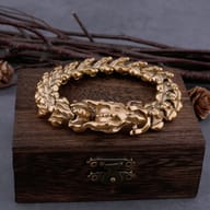 Top-down view highlighting the dual-tone finish of the dragon link bracelet