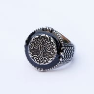 Men's Norse Yggdrasil Tree of Life biker ring shown worn on hand