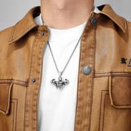 Rear view of the 316L stainless steel bodybuilder pendant, showing the solid metal construction and polished surface