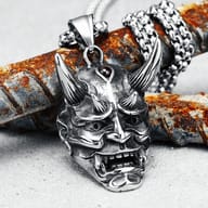 Angled view of the Prajna Hannya mask pendant with "PRAJNA" text overlay.