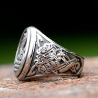 Close-up of the top face of the Viking ring, featuring the mythological bird design.