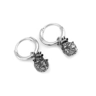 Detailed view of anatomical heart earrings showing dark oxidized accents and steel finish