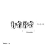 Side view of a resilient 316L stainless steel non-piercing ear cuff with fanged details.