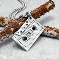Detailed view of retro cassette tape design on 316L stainless steel pendant