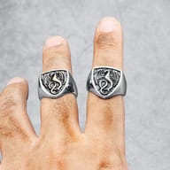 Front view of the 316L stainless steel ring, highlighting the embossed dragon on a shield emblem.