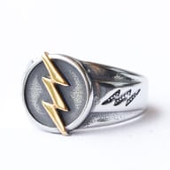 Men's 316L Stainless Steel ring with gold-plated lightning bolt on oxidized face