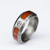 Full view of a men's stainless steel Viking Tree of Life ring with wood inlay and runes.