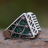 Top view displaying the textured grid design on a wide band stainless steel ring