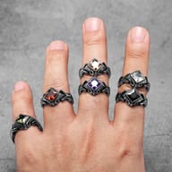 Top view of the Gothic stainless steel ring, highlighting the purple gemstone and intricate metalwork.