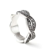 Stainless steel ring featuring intricate Nordic and Celtic inspired patterns from a slightly different angle.