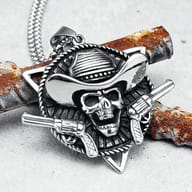 Detailed view of the stainless steel skull cowboy pendant with text
