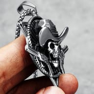 Close-up of the skull's face and cowboy hat on the pendant