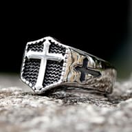 Side profile of the polished 316L stainless steel vintage cross ring, showcasing its sturdy band and finish.