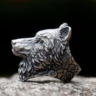 Upper body detail of the wolf head ring, showcasing the robust 316L stainless steel texture and design.