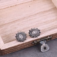 Side profile showing the secure steel post and back of the sunburst earring