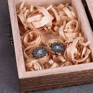 Front view of celestial eye stud earrings in oxidized stainless steel