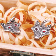 Both Norse wolf drop earrings displayed upright showing the complete drop charm design