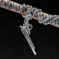 Full view of the gothic-style revolver pendant design