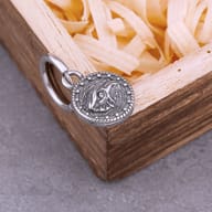 Side profile of a men's stainless steel dangle earring showing the hoop and detailed charm.