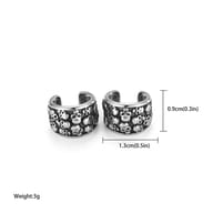 316L stainless steel skull pattern ear cuffs on branches with decorative natural ribbon.