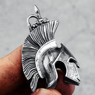 Side view of the stainless steel Spartan helmet pendant on a chain