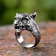 Gothic stainless steel tiger head ring worn on a man's finger