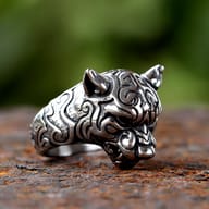 Top down perspective highlighting the sculpted ears and snout of the tiger head