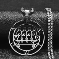Paimon Sigil 316L stainless steel pendant and chain on a black textured surface.