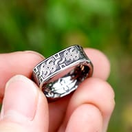 Lower band section of the Viking Celtic knot ring, emphasizing the continuous pattern work.