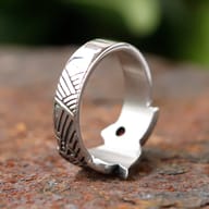 Viking dragon ring worn on a hand, showing its scale and fit
