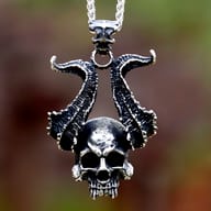 Horned skull pendant shown with stainless steel link chain