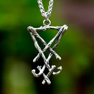 Close up of the antiqued branch details on the Lucifer sigil pendant