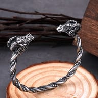 Top-down view showing the open cuff design and detailed ram horns
