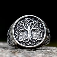 Detailed view of the Tree of Life Yggdrasil emblem on the durable stainless steel ring.