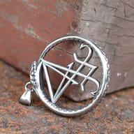 Full view of the bold metallic Lucifer Sigil Ouroboros pendant.