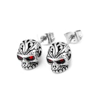 Stainless steel skull stud earring positioned to show the post and secure backing