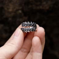 Detailed close-up of the sturdy 316L stainless steel gothic ring's segmented structure.