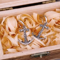 Angled shot highlighting the antique oxidized finish on the stainless steel anchor