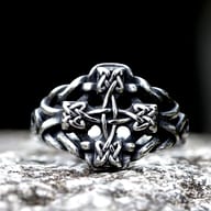 Side profile showcasing the intricate openwork woven band of the Celtic ring