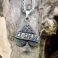 Silver-tone Ace of Spades punk pendant featuring ornate scrollwork and chain