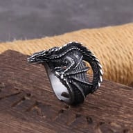 Side view of the Viking dragon ring, showcasing its winged design and textured body