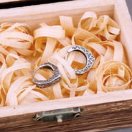 Side angle showing the hinged click clasp on the Nordic stainless steel huggie earrings